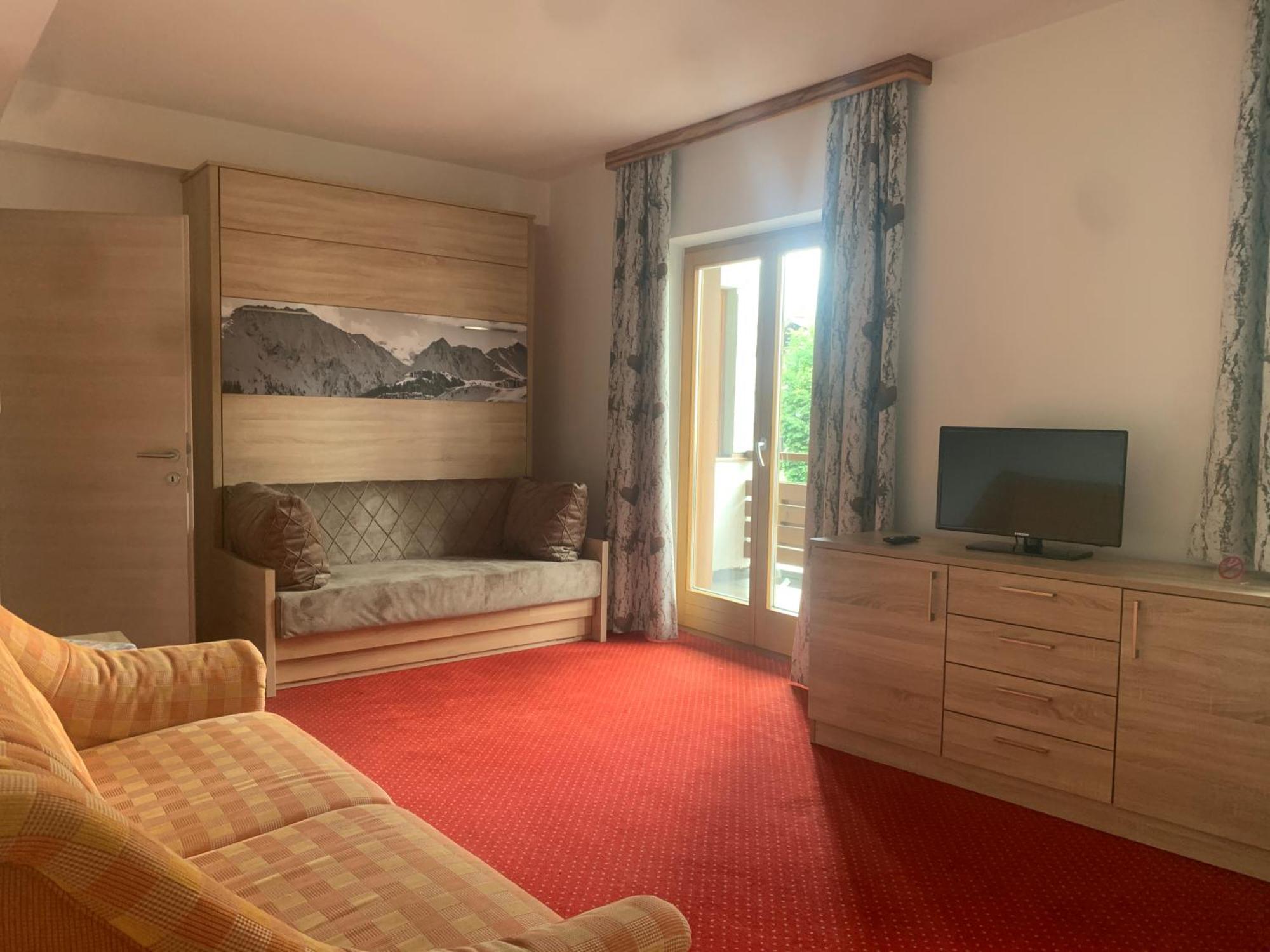 Appartements Robert - Hotel Bechlwirt キルヒベルク・イン・チロル エクステリア 写真